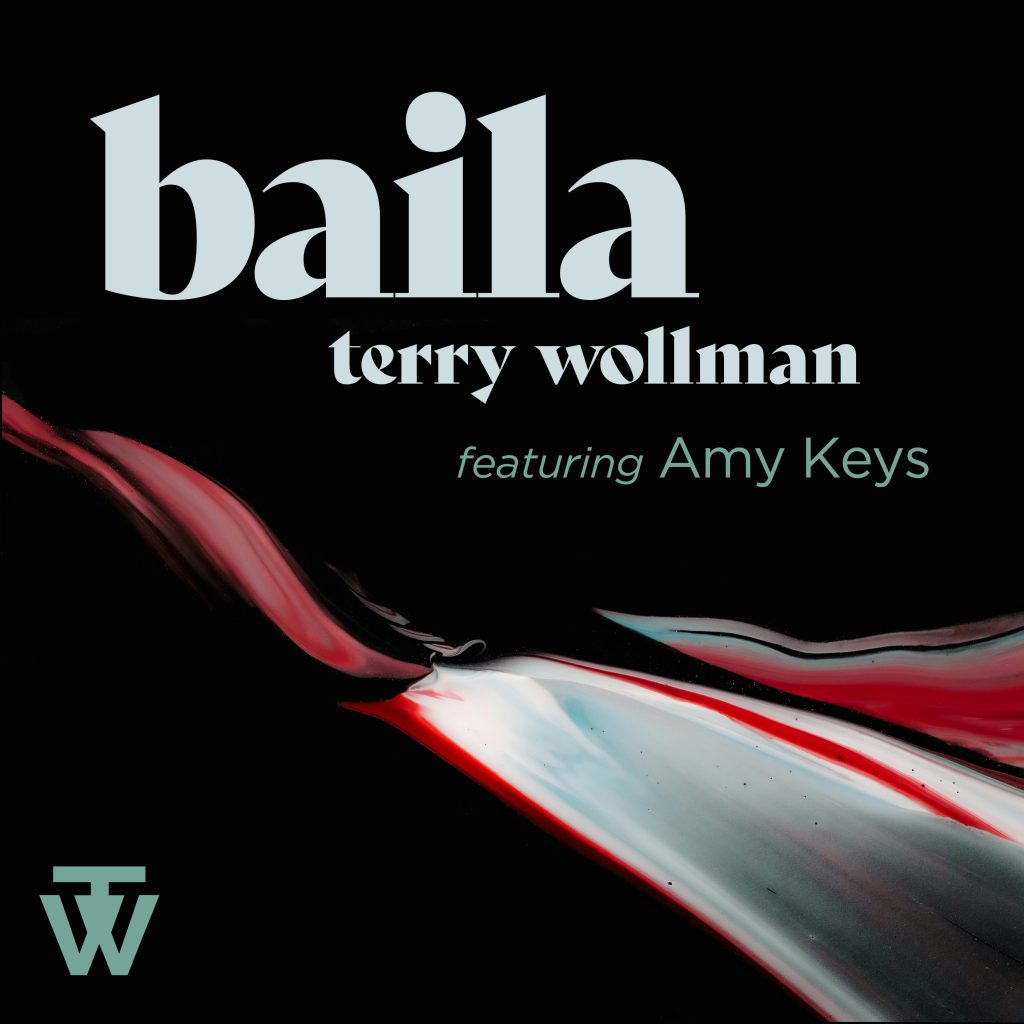 Album art for the song "Baila" by Terry Wollman featuring Amy Keys, featuring a stylized green logo on a black background with abstract red and light streaks.